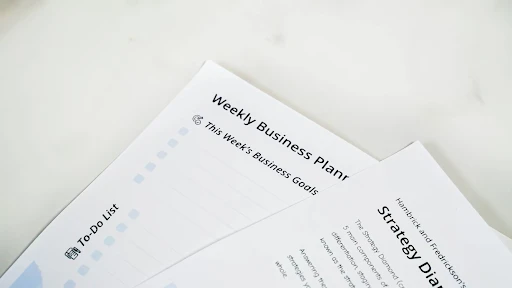 Business plans and HR strategy papers illustrating alignment of HR with business goals