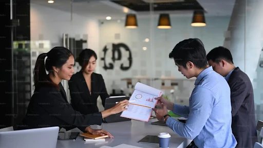 Employees discussing workplace guidelines and HR policies